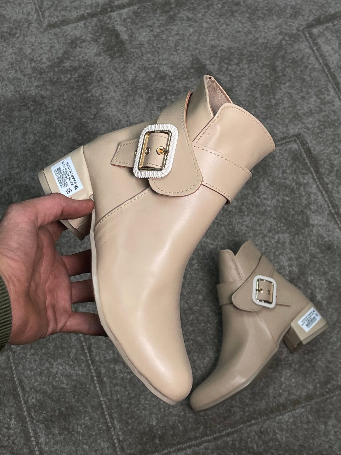 Bottines avec boucle croisee